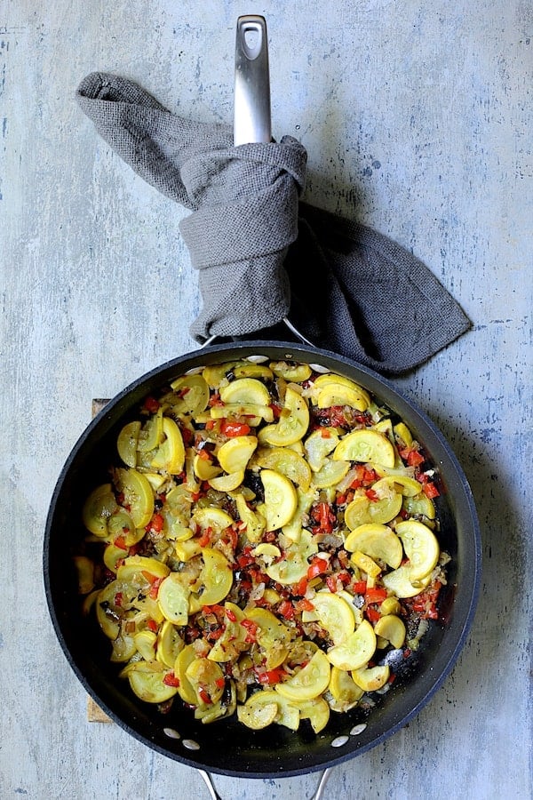 Photo of sauteed yellow squash in skillet.