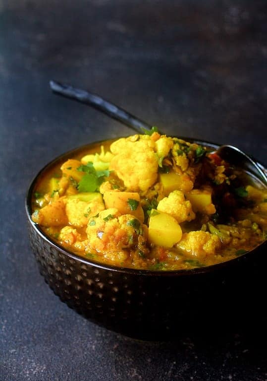 Cauliflower, Red Lentil and Potato curry in bowl.