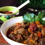 Moroccan Beef Stew in white serving bowl.
