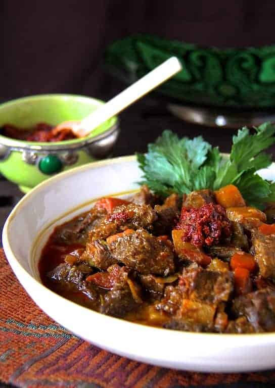 Moroccan Beef Stew in white serving bowl.