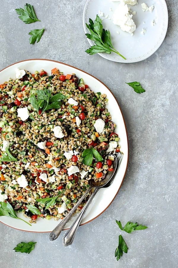 Photo of Mediterranean Farro Salad with feta cheese and fresh parsley.