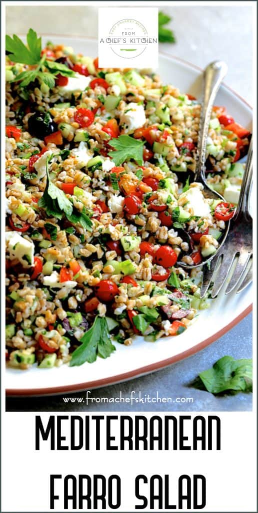Pinterest graphic for Mediterranean Farro Salad showing it on a white round platter with serving utensils.
