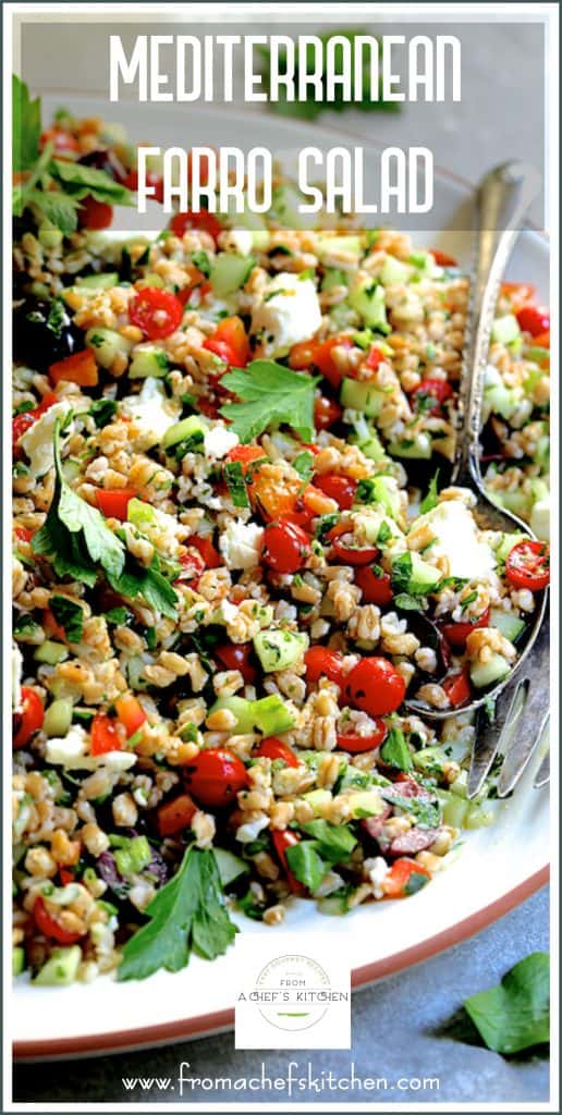 Pinterest graphic for Mediterranean Farro Salad showing it on a white round platter with serving utensils.