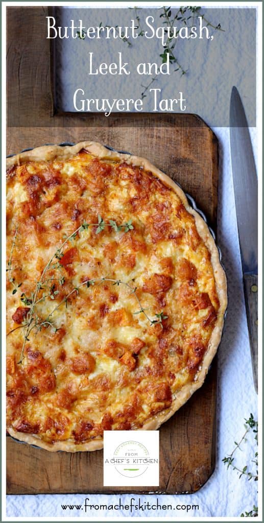 Pinterest graphic for Butternut Squash, Leek and Gruyere Tart on wood cutting board.