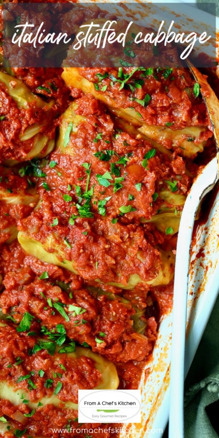 Italian Stuffed Cabbage with white serving spoon in white baking dish.
