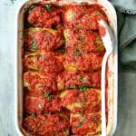 Spicy Italian Stuffed Cabbage in white rectangular baking dish.