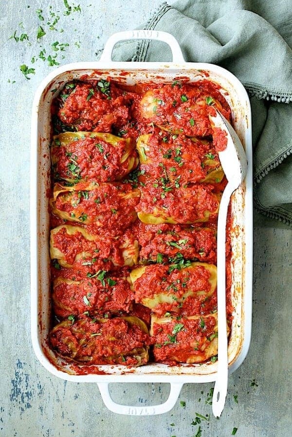 Spicy Italian Stuffed Cabbage in white rectangular baking dish.