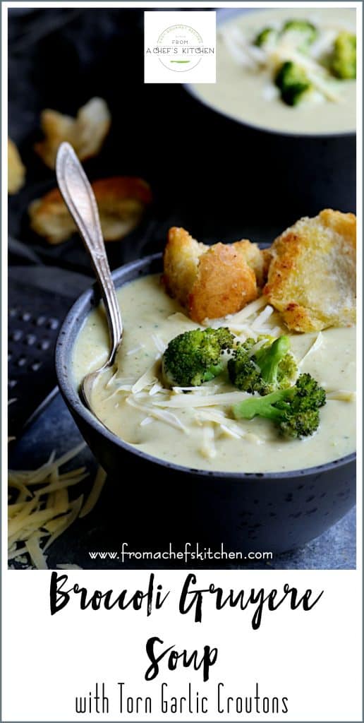 Pinterest graphic for Broccoli Gruyere Soup showing one serving in a blue bowl.