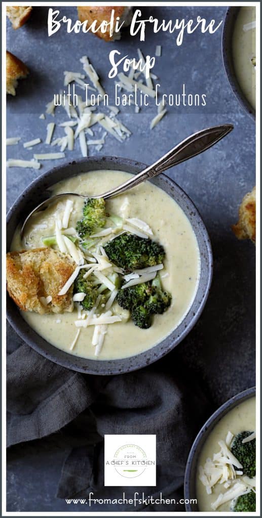 Pinterest graphic for Broccoli Gruyere Soup showing one serving in a blue bowl.