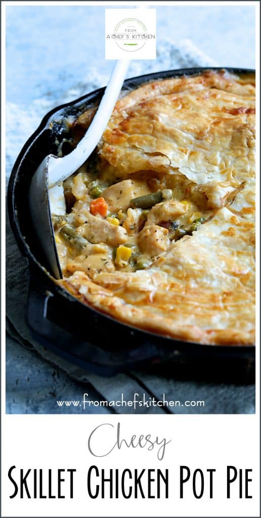 Pinterest graphic for Cheesy Skillet Chicken Pot Pie showing one piece removed with the filling exposed.