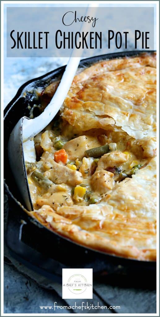 Pinterest graphic for Cheesy Skillet Chicken Pot Pie showing one piece removed with the filling exposed.
