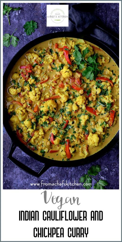 Pinterest graphic for Vegan Indian Cauliflower and Chickpea Curry showing it in a black cast iron skillet.
