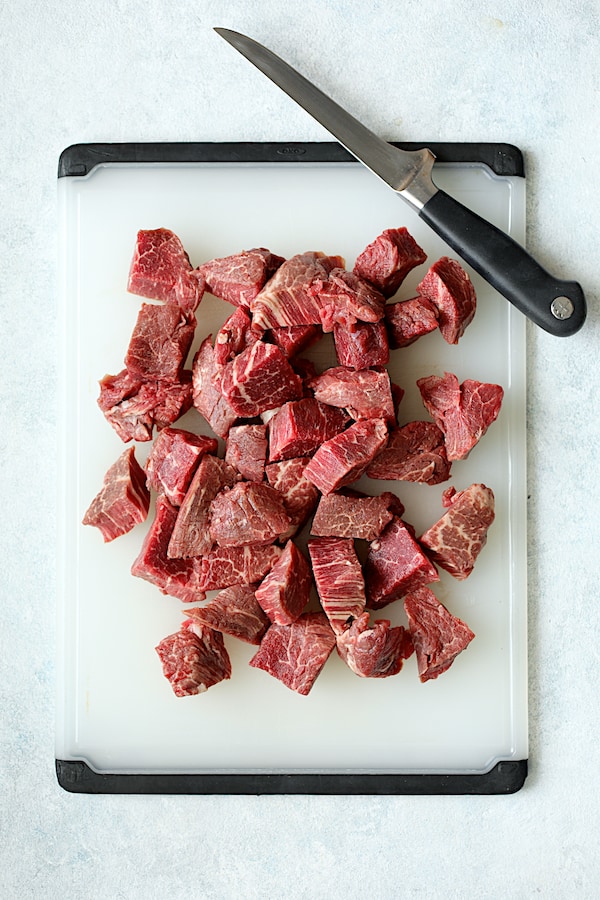 Overhead shot of steaks cut into bite-sized pieces