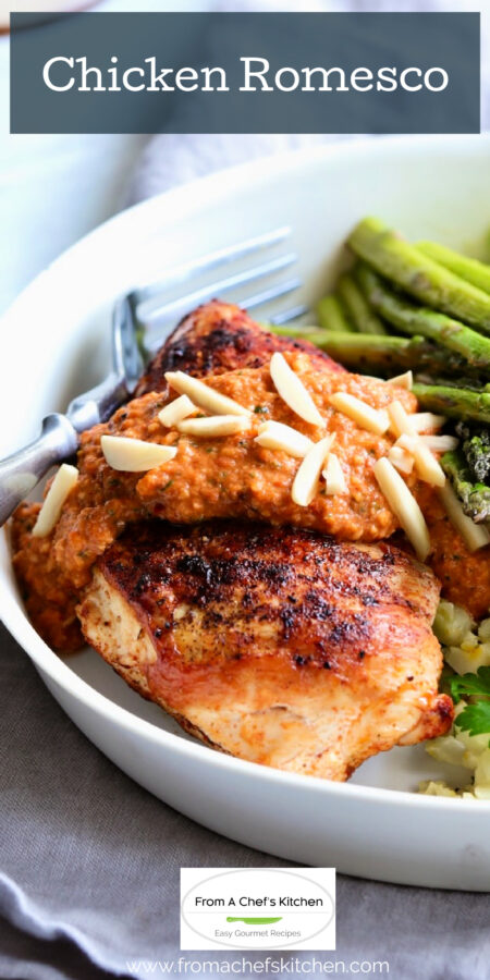 Pinterest graphic for Chicken with Romesco showing it in a white dinner bowl.