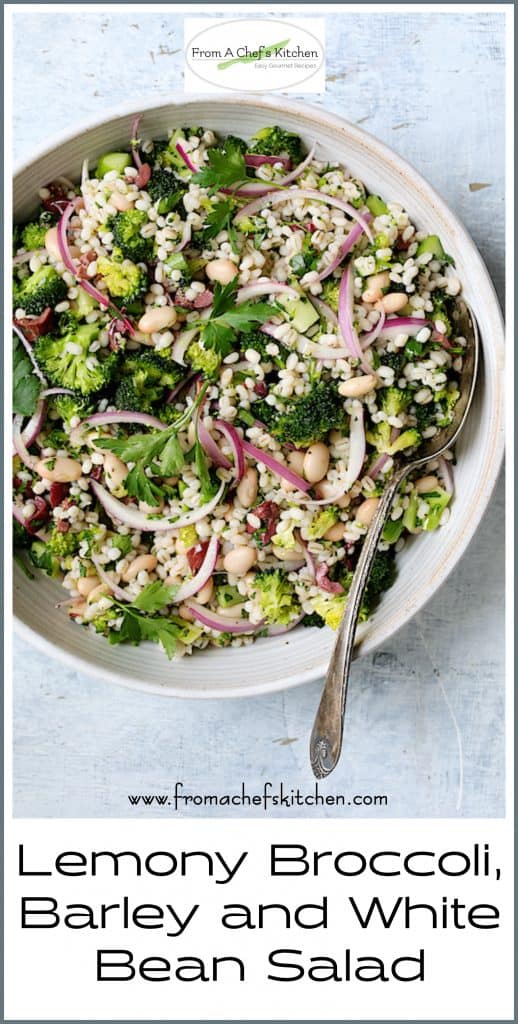 Pinterest graphic for Lemony Broccoli, Barley and White Bean Salad showing it in a white serving bowl with serving spoon.