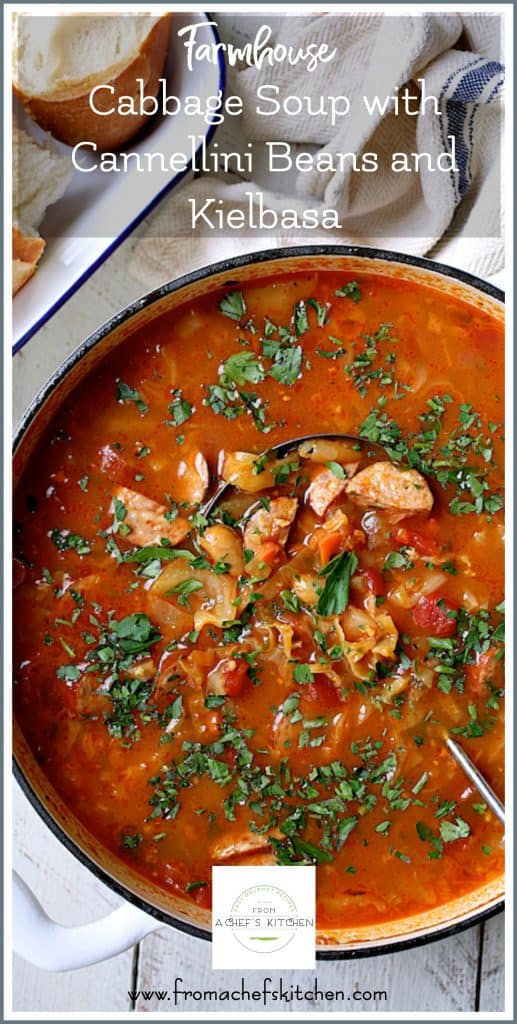 Pinterest graphic for Farmhouse Cabbage Soup with Cannellini Beans and Kielbasa showing it in a white Dutch oven.