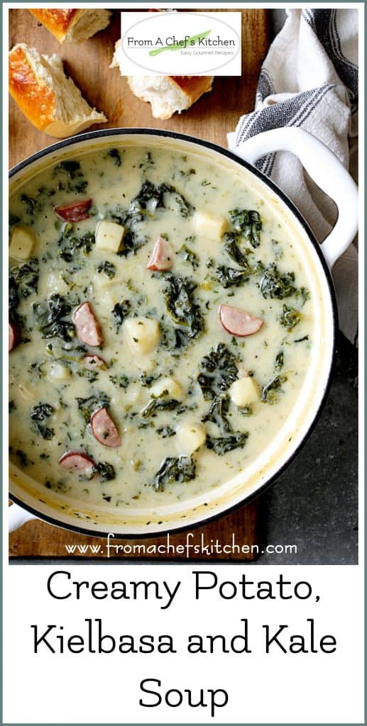 Pinterest graphic for Creamy Potato, Kielbasa and Kale Soup showing it in a white enamel cast iron skillet.