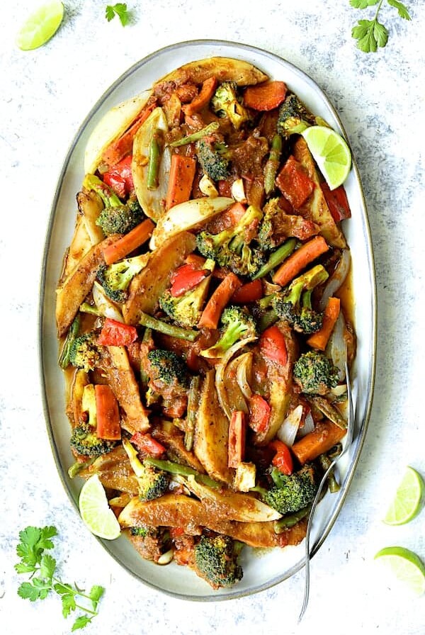 Curried Roast Vegetables on oval gray platter.