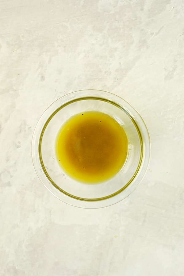 Photo of vinaigrette in glass bowl.