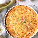 Whole Spicy Baked Denver Omelet on wire cooling rack.