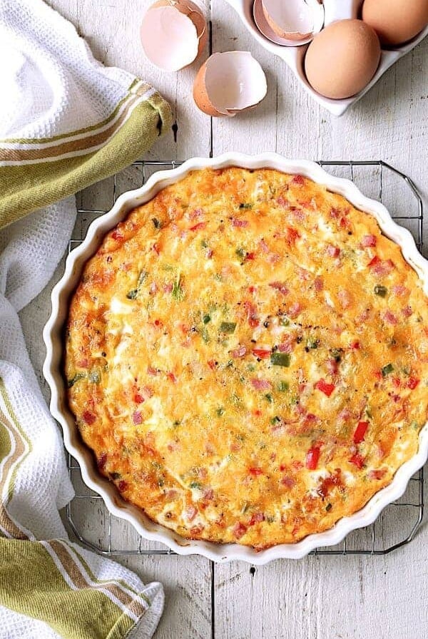 Whole Spicy Baked Denver Omelet on wire cooling rack.