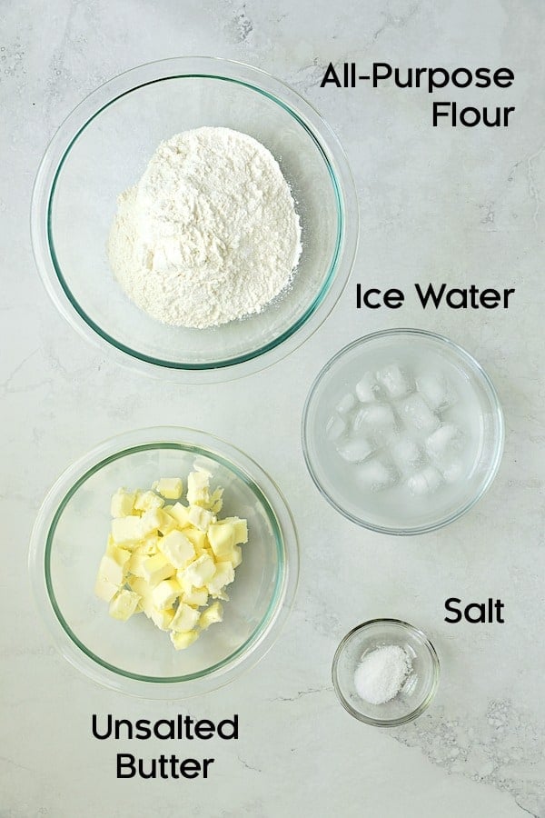 Photo of ingredients for crust in glass bowls.
