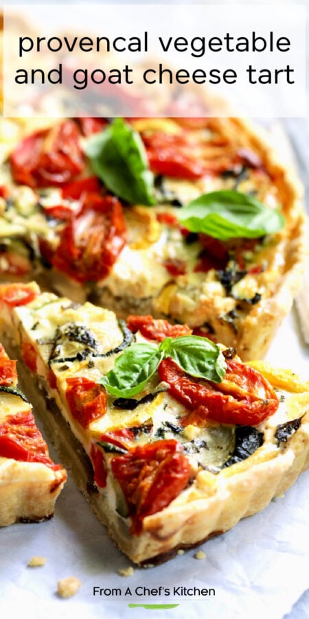 Pinterest graphic for Provencal Vegetable and Goat Cheese Tart showing one slice cut from the tart.