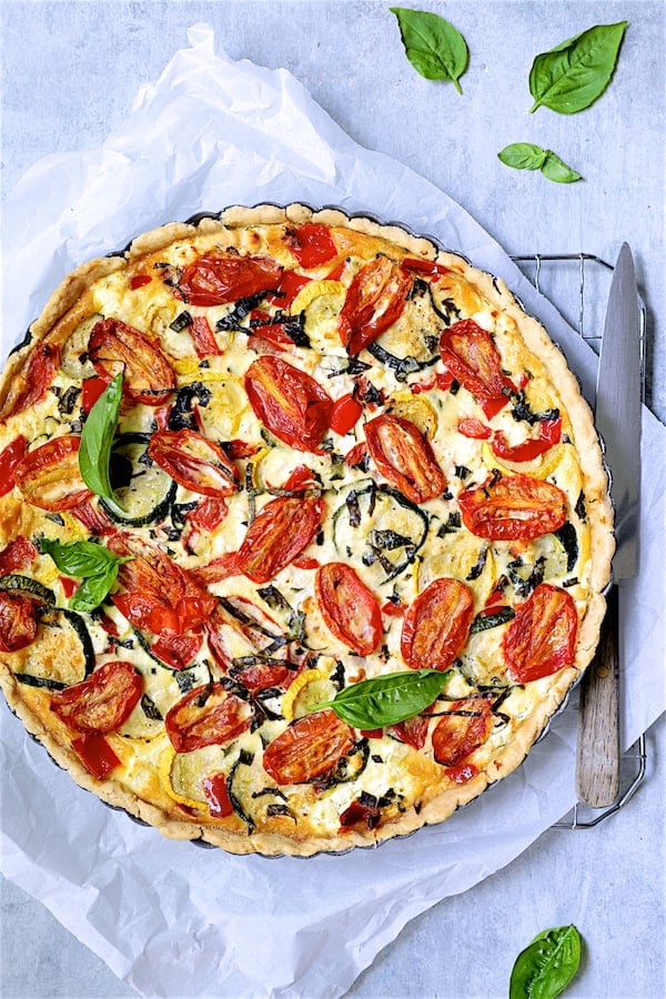 Photo of whole Provencal Vegetable and Goat Cheese Tart on cooling rack.