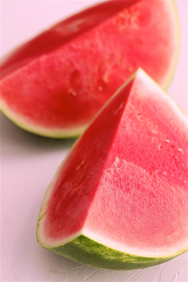 Photo of two watermelon wedges.