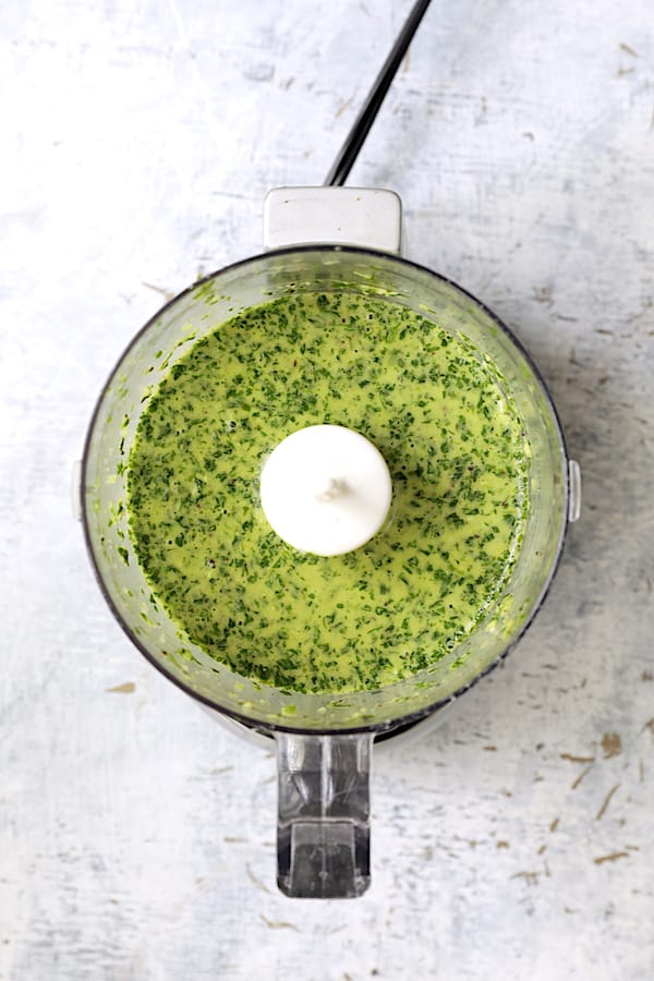 Photo of cilantro lime dressing in food processor.