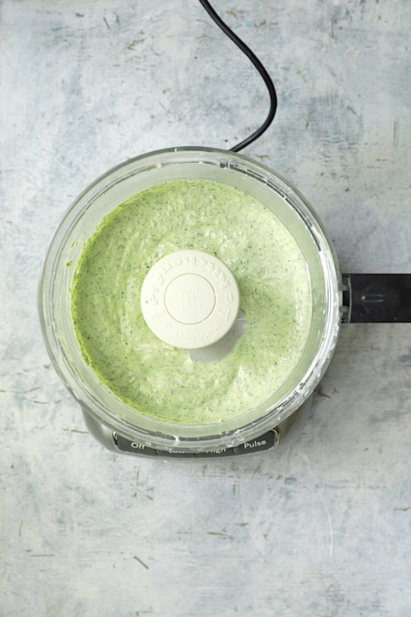 Photo of cilantro yogurt sauce in food processor.