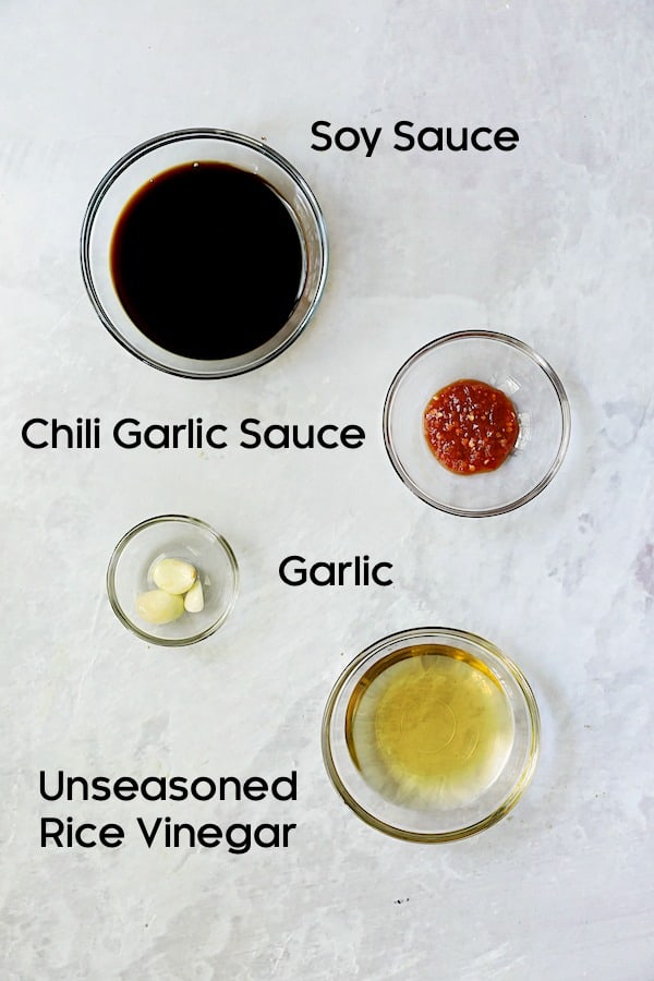 Photo of ingredients for Spicy Garlic Dipping Sauce in glass bowls.