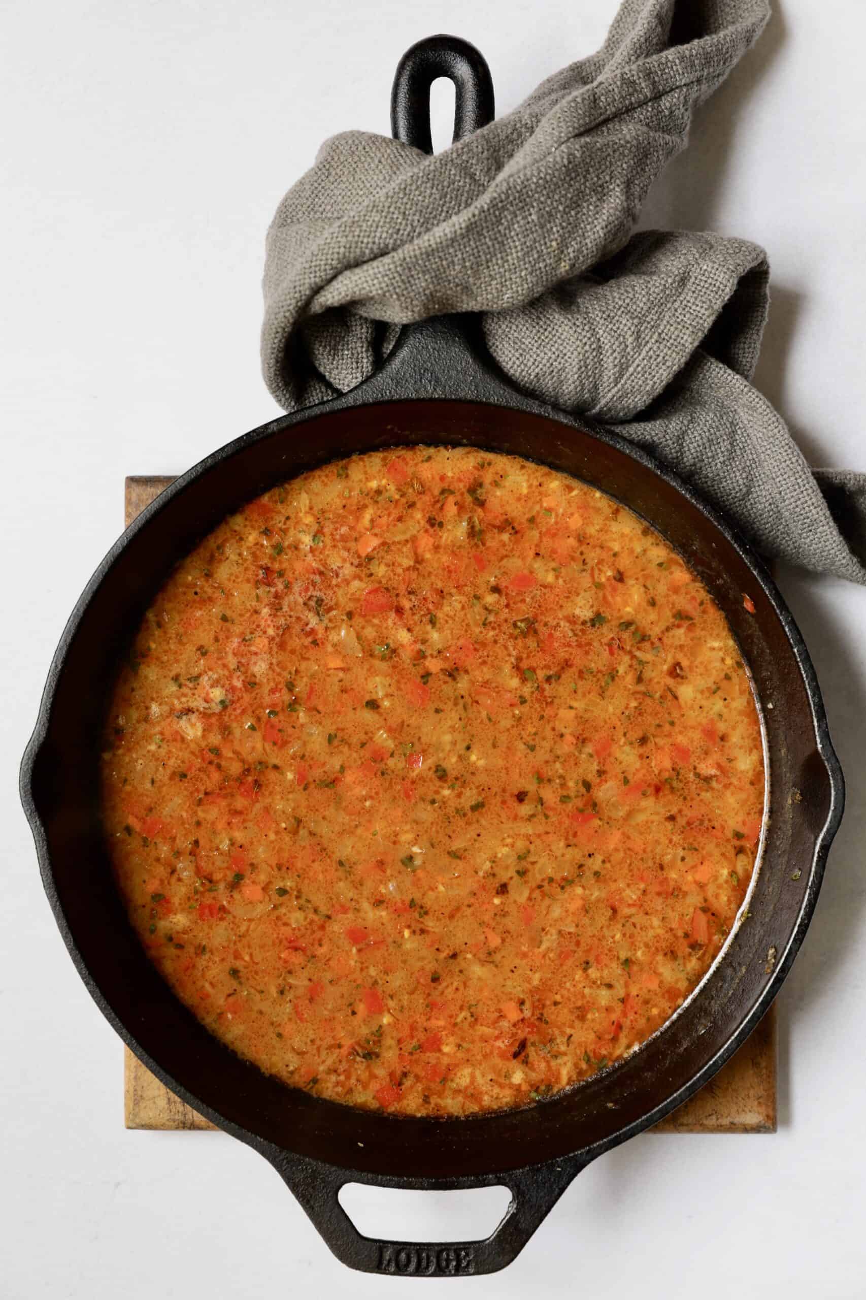 Photo of Cajun sauce in cast iron skillet.