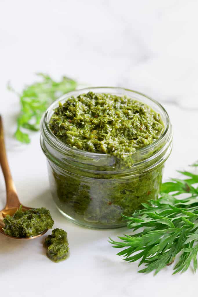 Photo of Carrot Top Salsa Verde in glass jar.