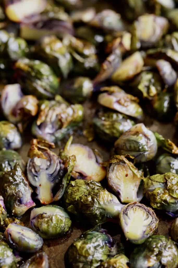 Close-up photo of roasted purple Brussels Sprouts.