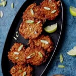 Korean Sweet Potato Fritters with Gochujang Mayonnaise - Overhead shot of fritters on angled black platter