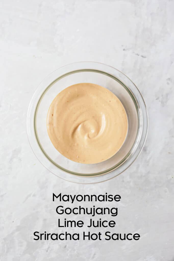 Photo of Gochujang Mayonnaise in glass bowl with ingredients listed.