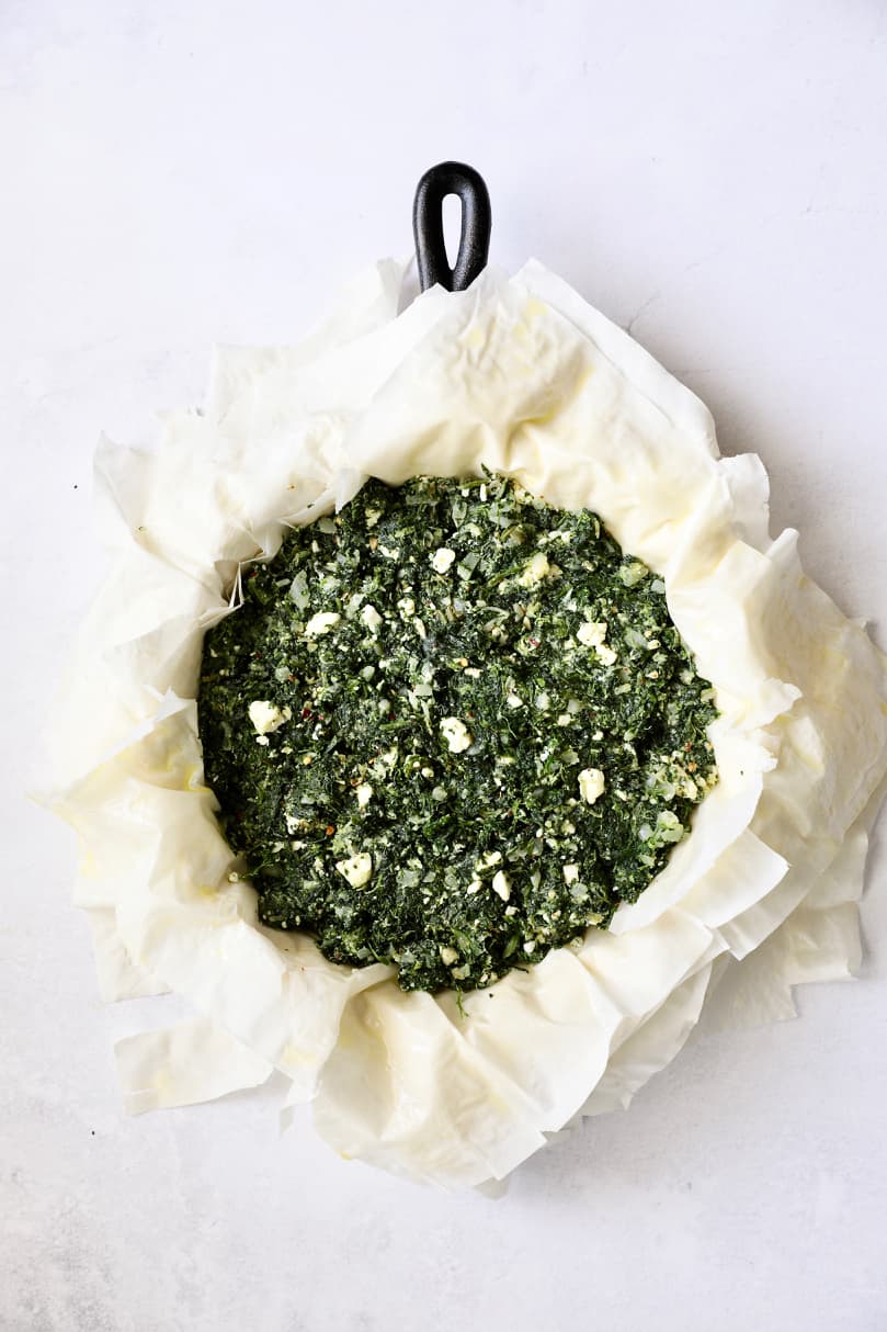 Photo of spanakopita before being baked and before phyllo is placed over the top.