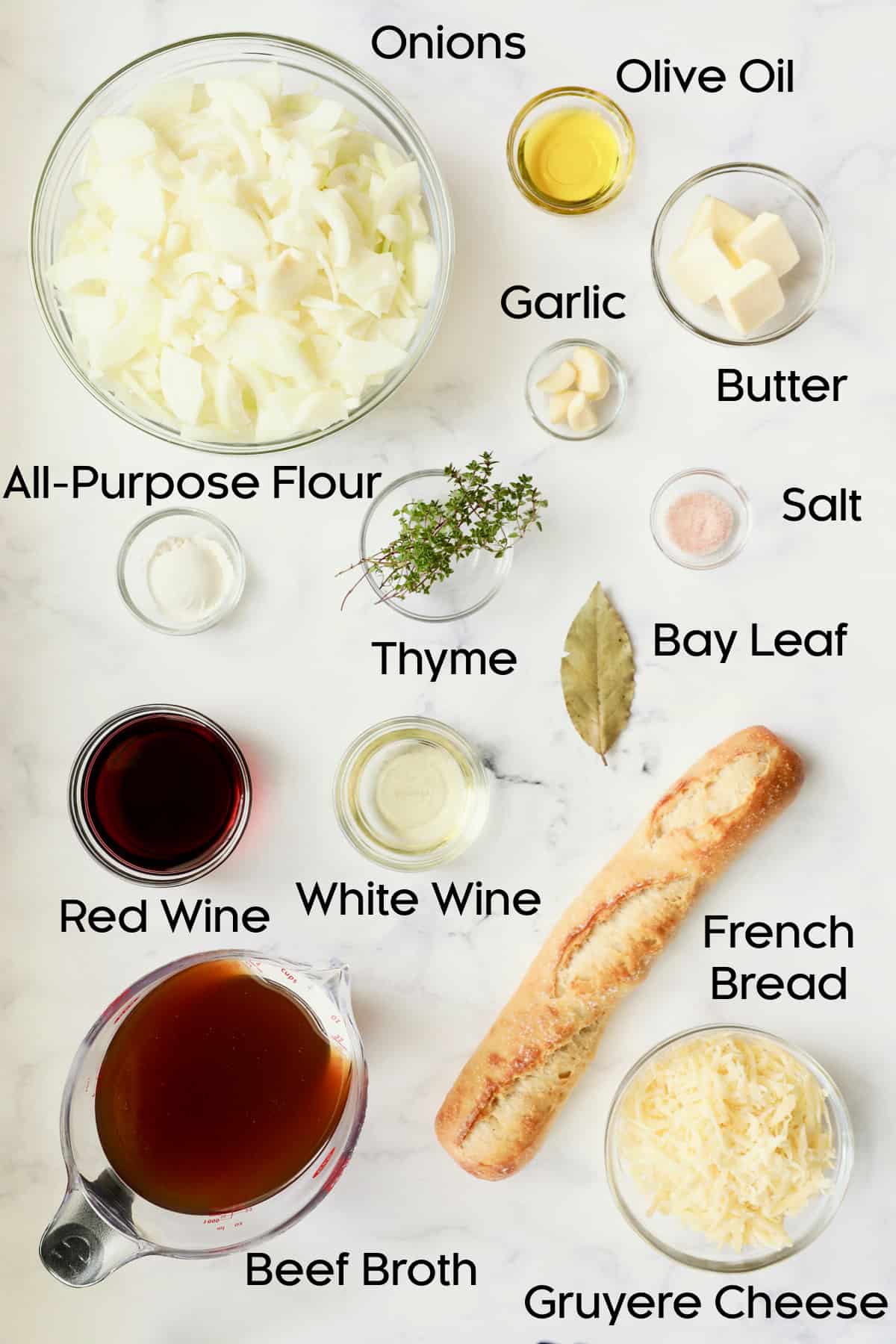 Photo of ingredients for French Onion Soup for Two in glass bowls.