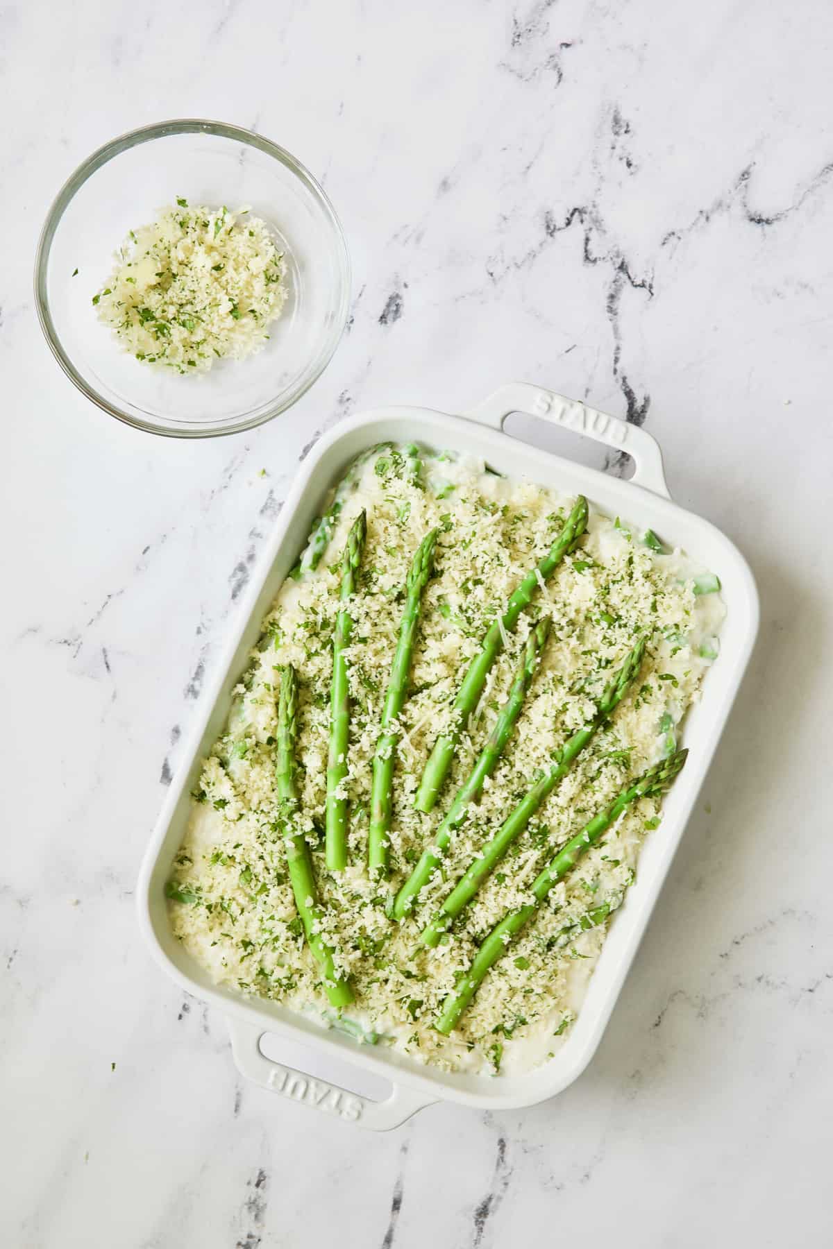 Photo of asparagus casserole after breadcrumb topping applied.