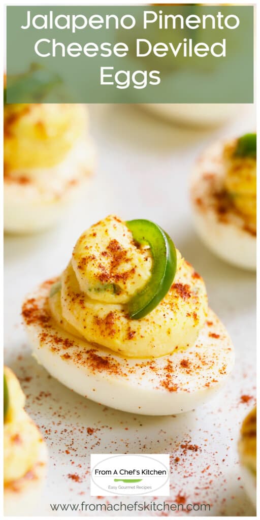 Close-up of Pimento Cheese Deviled Egg on white platter.