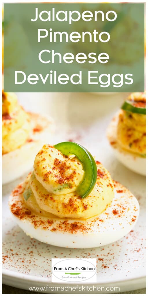 Close-up of Pimento Cheese Deviled Egg on white platter.