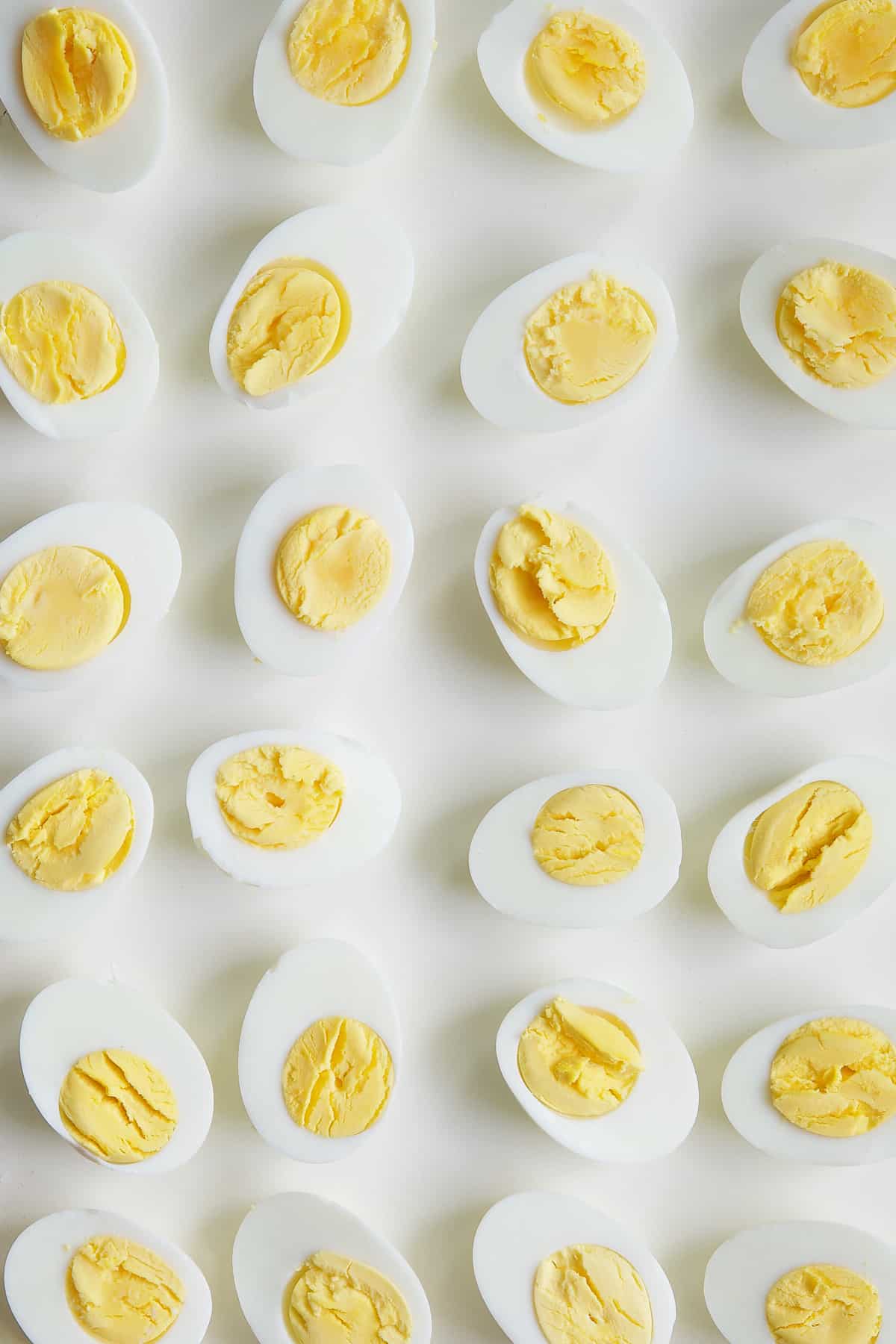 Photo of hard-cooked halved eggs.