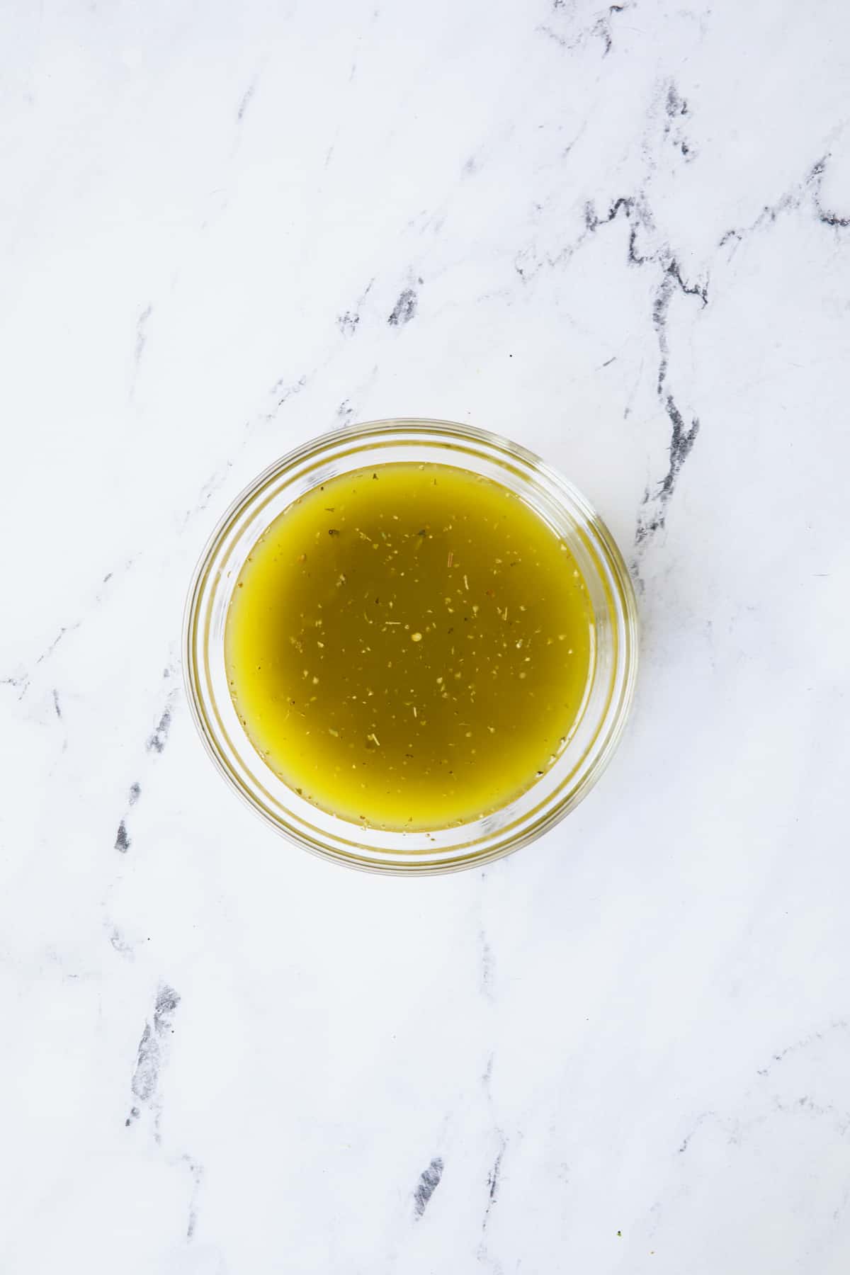 Photo of dressing in glass bowl.