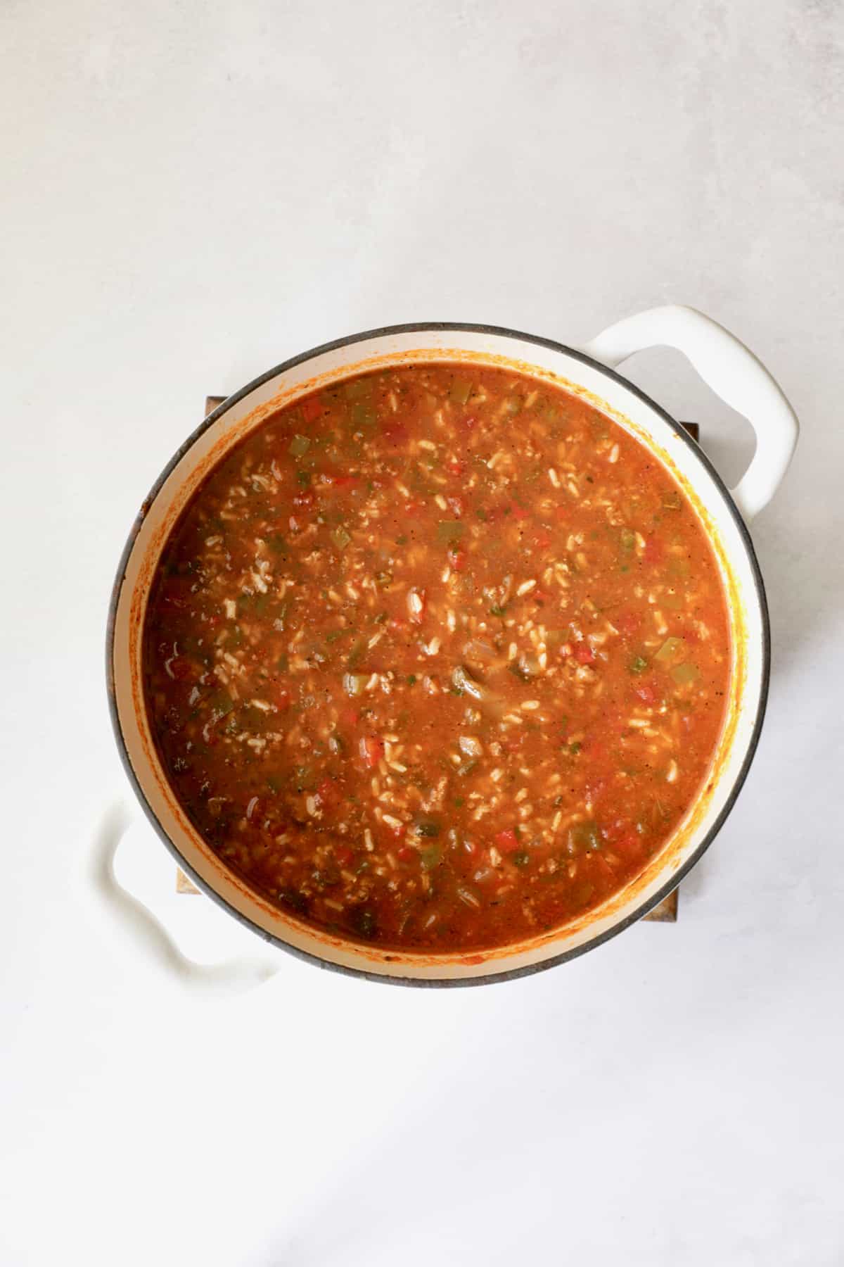 Photo of Southwestern Stuffed Pepper Soup in Dutch oven after being cooked.