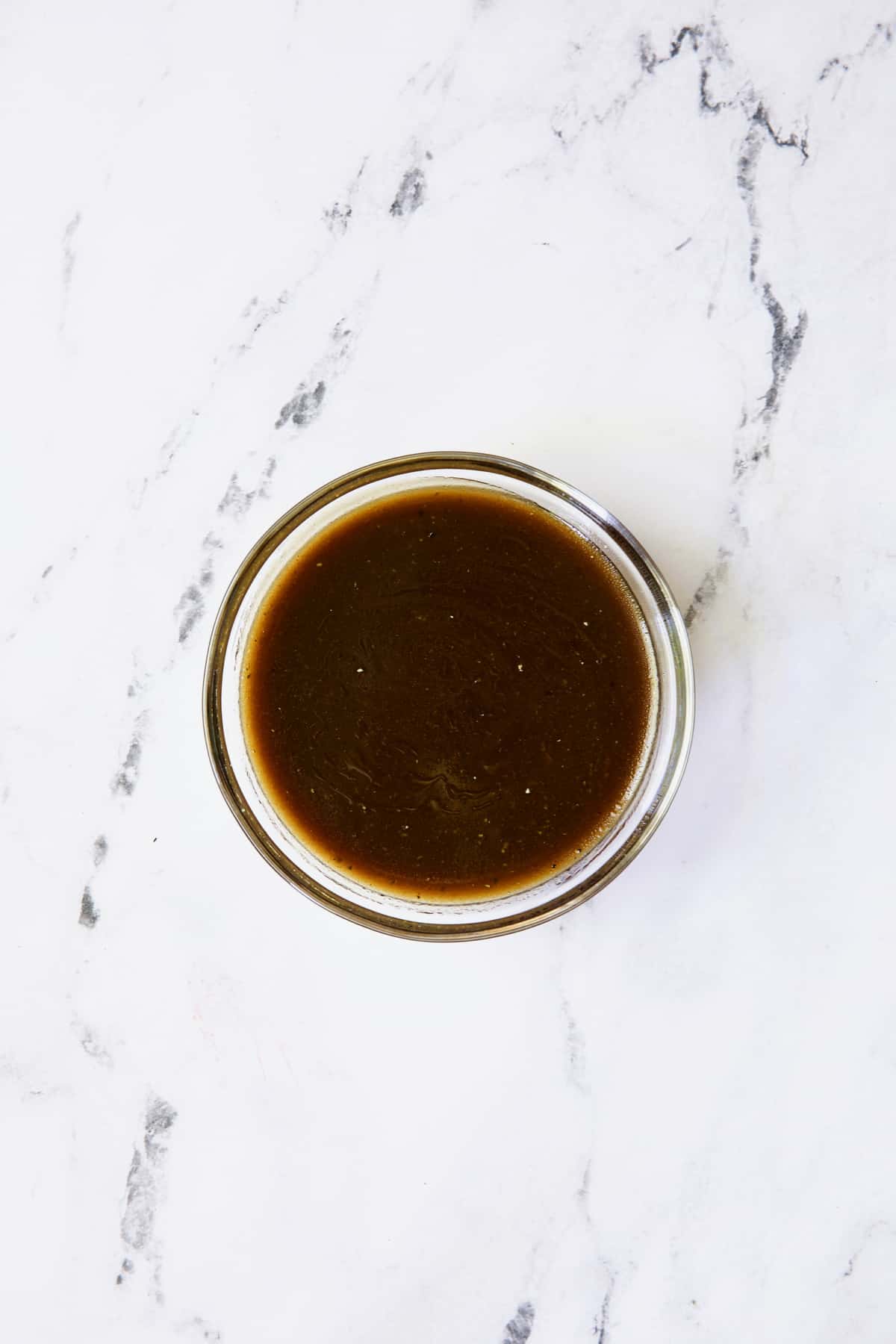 Honey Balsamic Dressing in glass bowl.