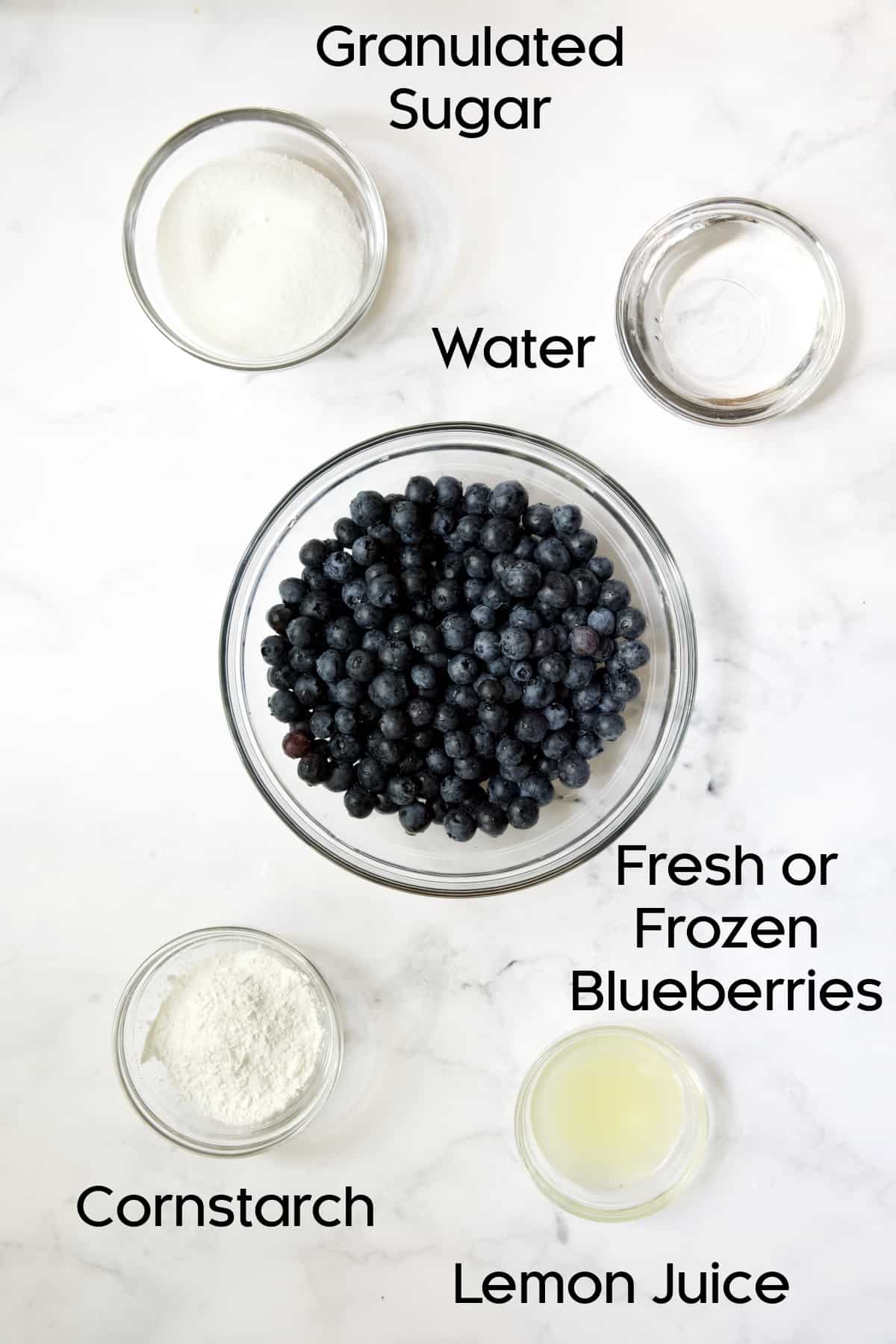 Photo of ingredients for Blueberry Cream Cheese Pie in glass bowls.