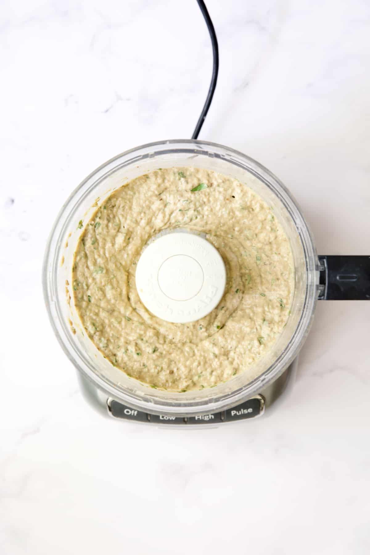 Eggplant Dip (Baba Ganoush) in food processor after being pureed.