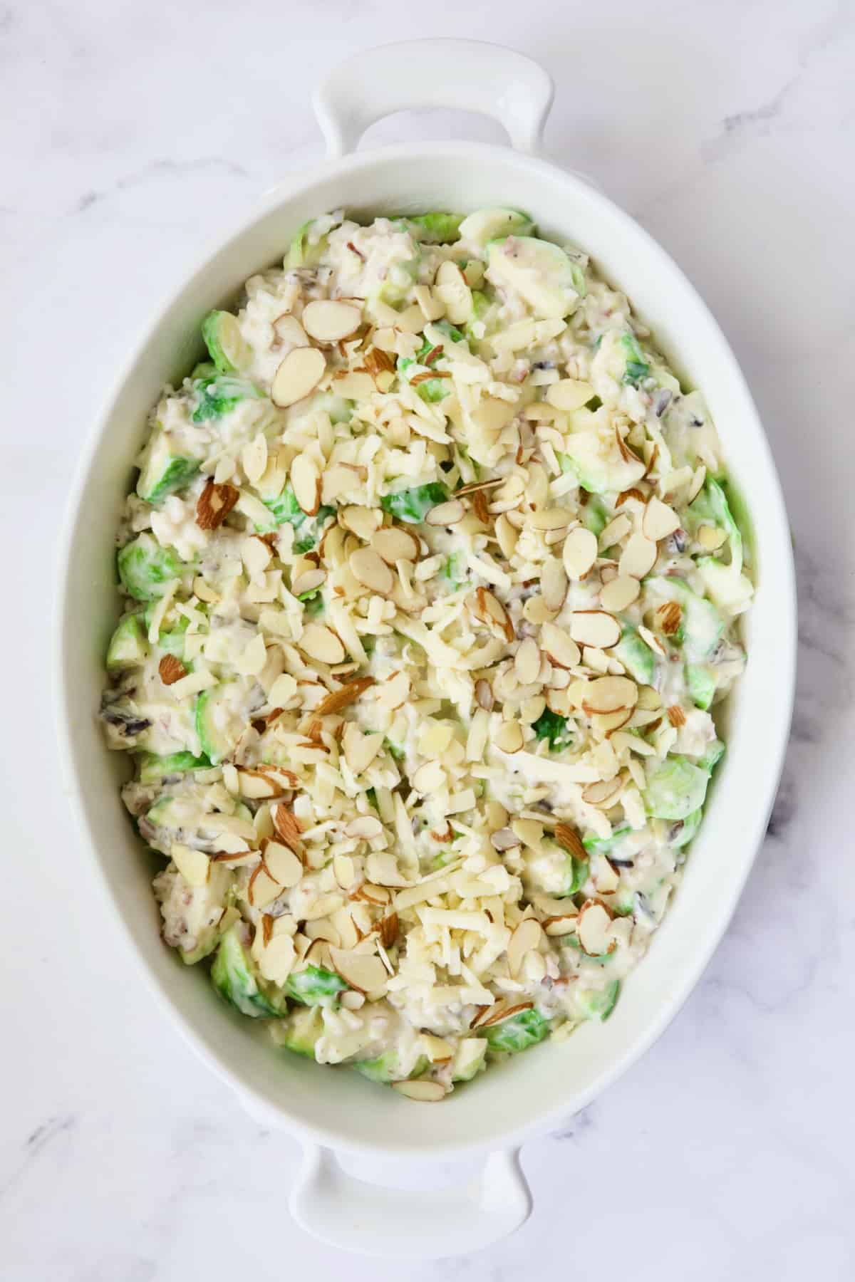 Cheesy Brussels Sprouts and Wild Rice Casserole before being baked.