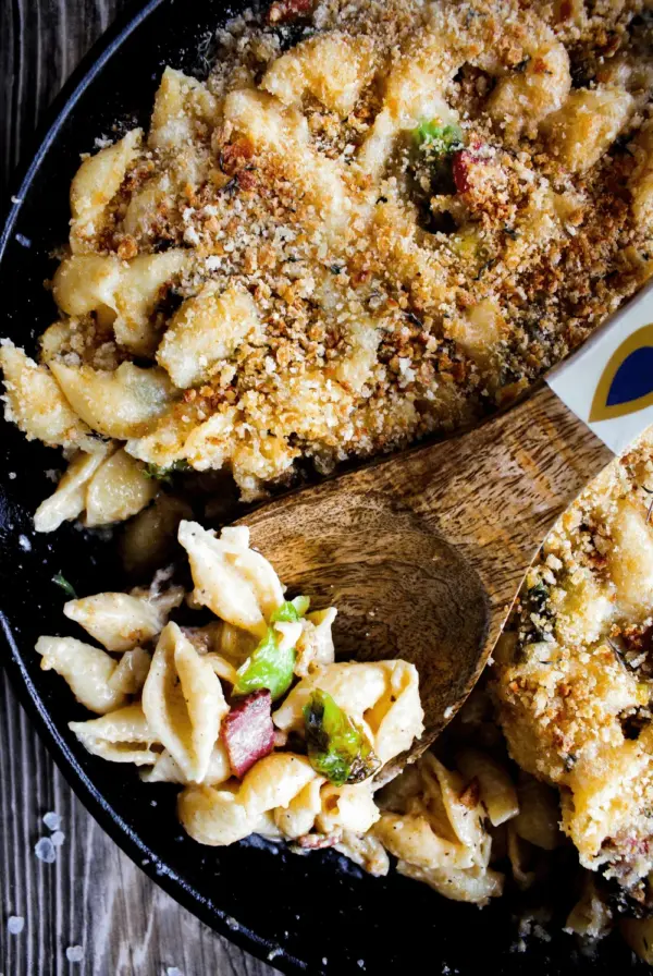 Mac and Cheese with Brussels Sprouts and Bacon in cast iron skillet.